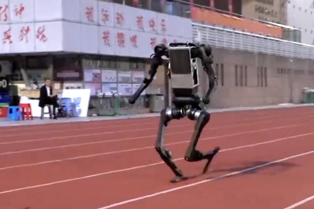 ** Unitree H1 humanoid robot running on outdoor track at record-breaking speed