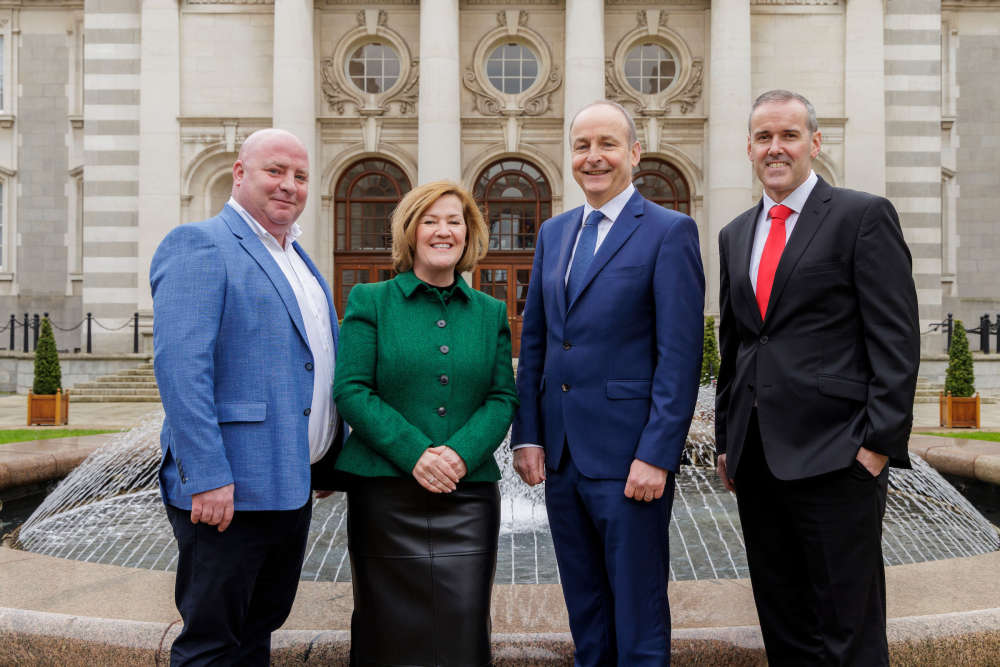Business leaders and Irish Taoiseach celebrating new Equinix manufacturing facility announcement in Dundalk