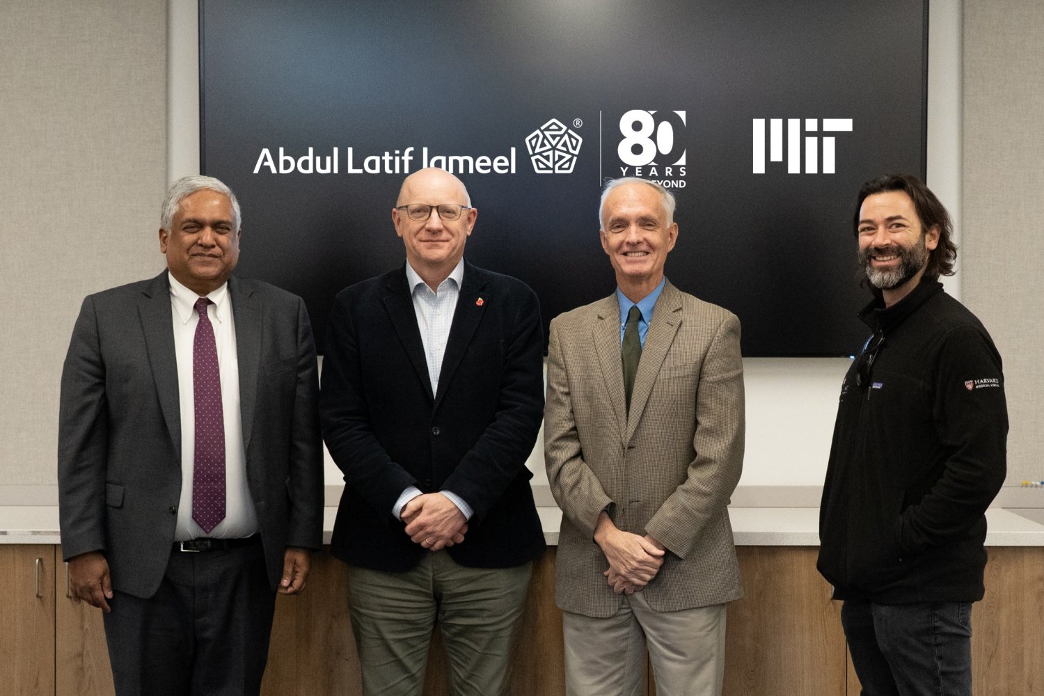 MIT professors and research partners signing antimicrobial resistance project agreement at ceremony
