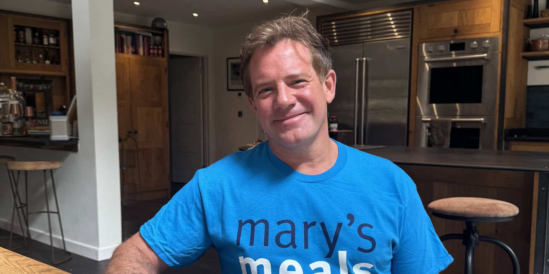 TV chef Matt Tebbutt smiling, promoting charity campaign to feed hungry schoolchildren worldwide