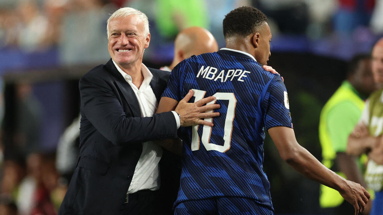 Mbappé Scores Twice as France Advances Through Storm Delay