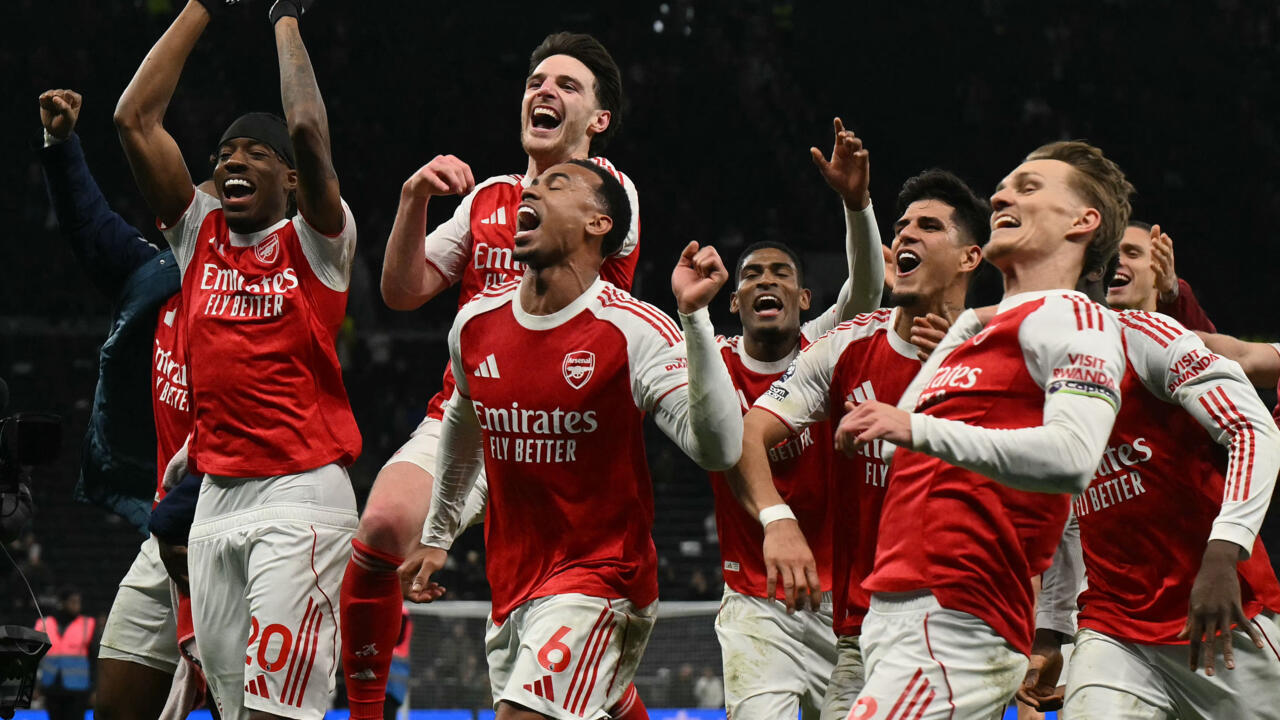 Arsenal players celebrating their Premier League championship victory after 22 years of waiting