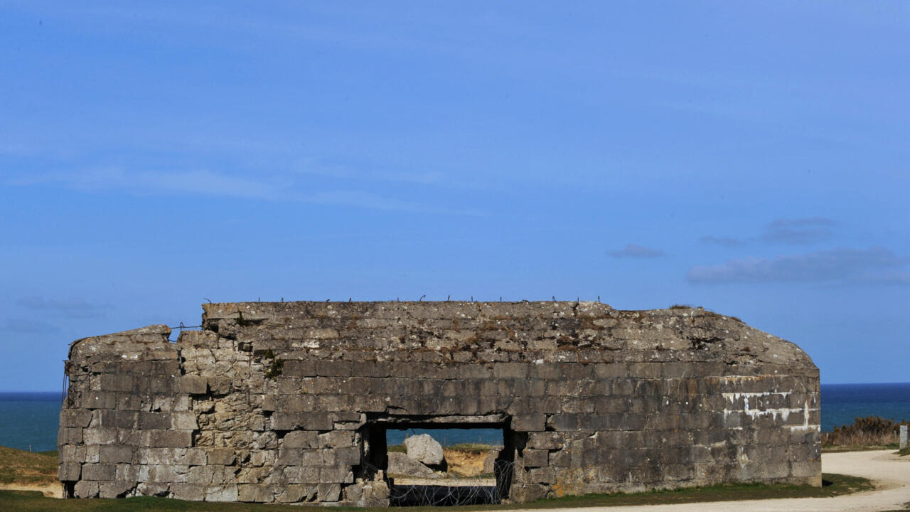 German concrete bunker overlooking Normandy beach where Allied forces landed on D-Day 1944