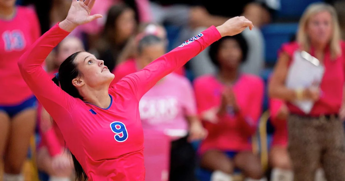 McKenna Gobin serving volleyball during match against Steele Knights in San Antonio