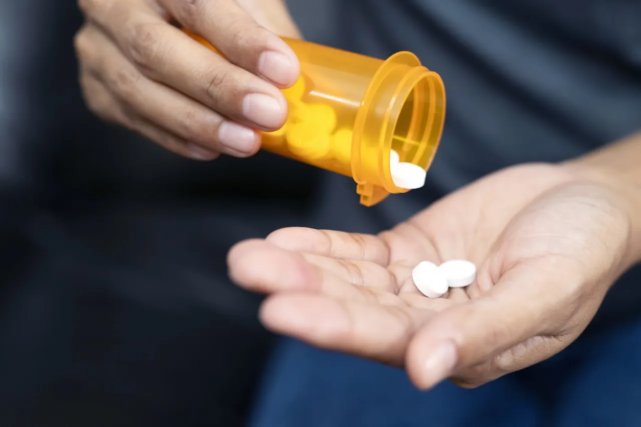 Close-up of biodegradable smart pill capsule developed by MIT engineers for medication tracking