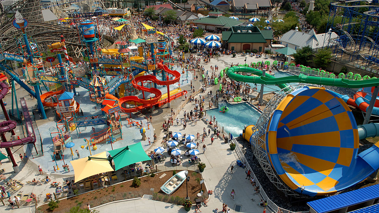 Families enjoying rides and attractions at Hersheypark amusement park in Pennsylvania