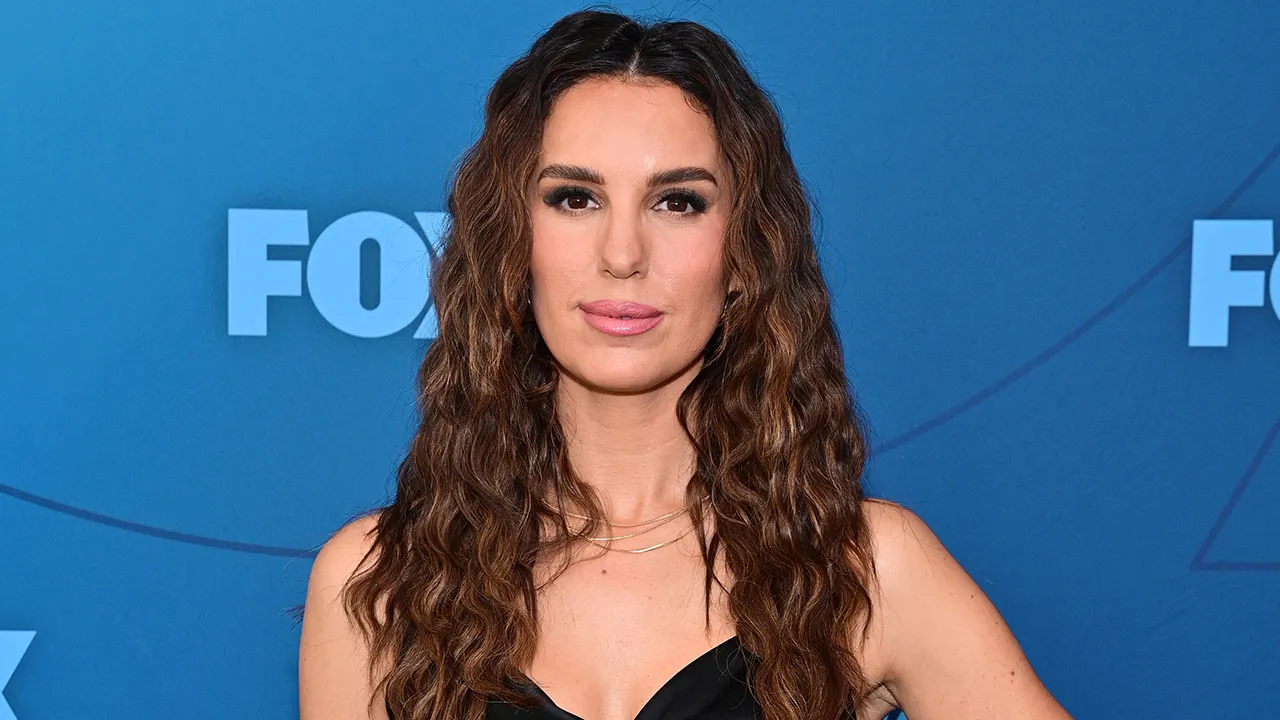 Christy Carlson Romano speaking at event, encouraging cancer awareness and early detection