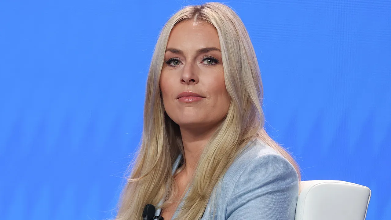 Lindsey Vonn in ski gear concentrating before Olympic alpine skiing training session in Italy