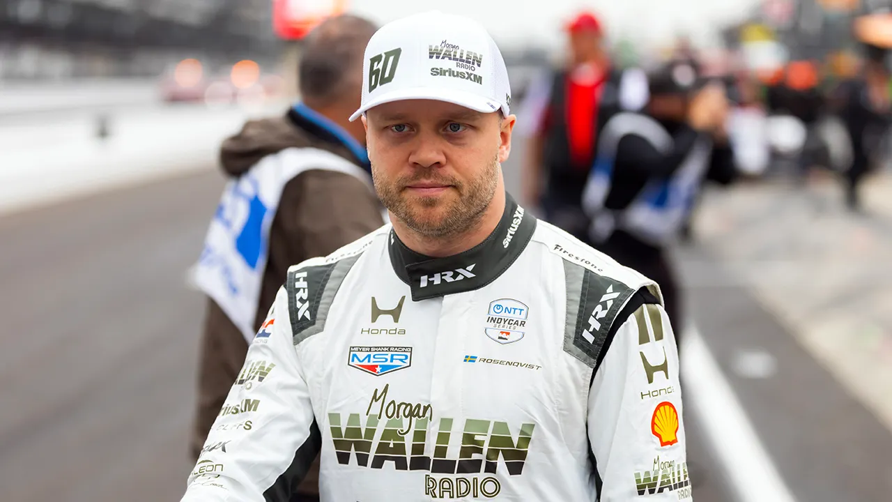 Felix Rosenqvist celebrating in his Meyer Shank Racing Honda after winning the Indianapolis 500