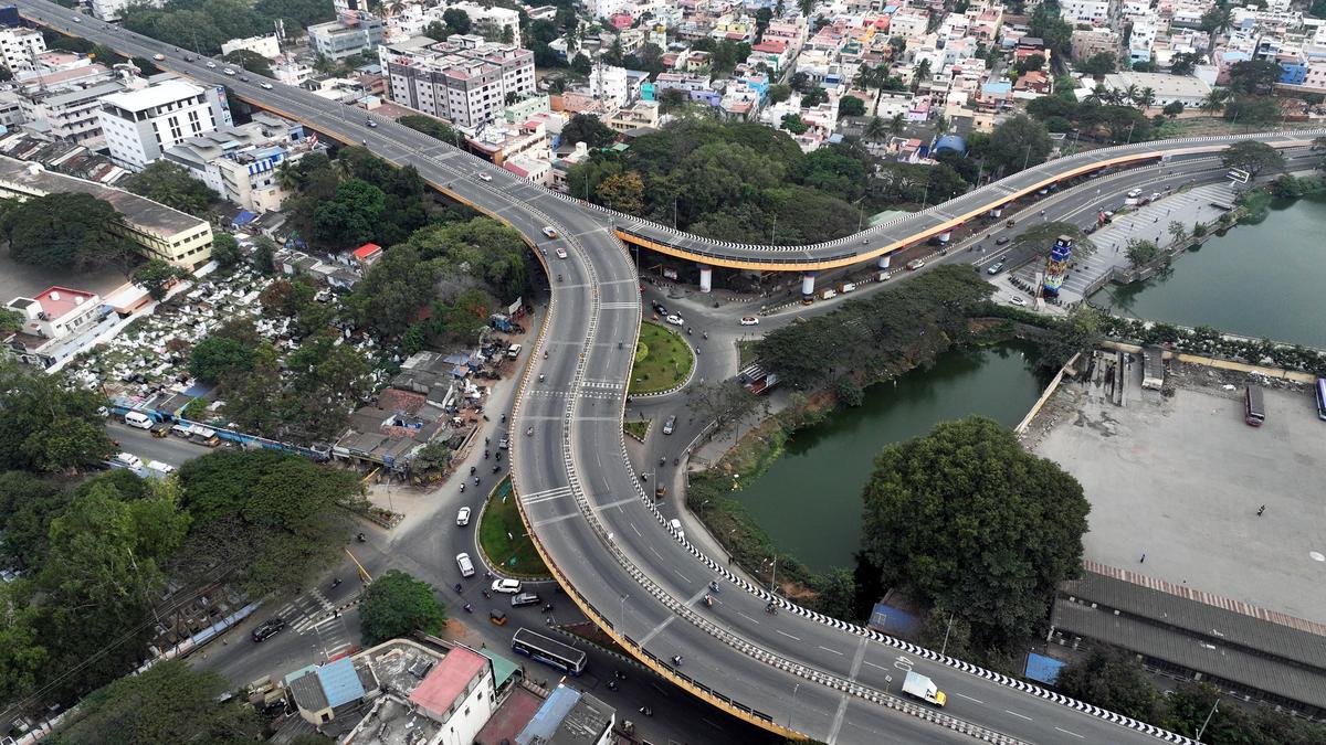Elevated flyover road in Coimbatore city, Tamil Nadu, India during daytime traffic