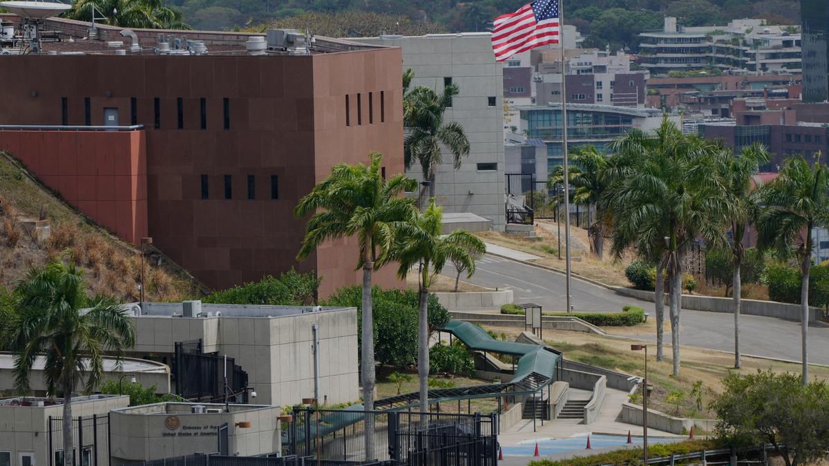 American flag waving outside the United States Embassy building in Caracas, Venezuela