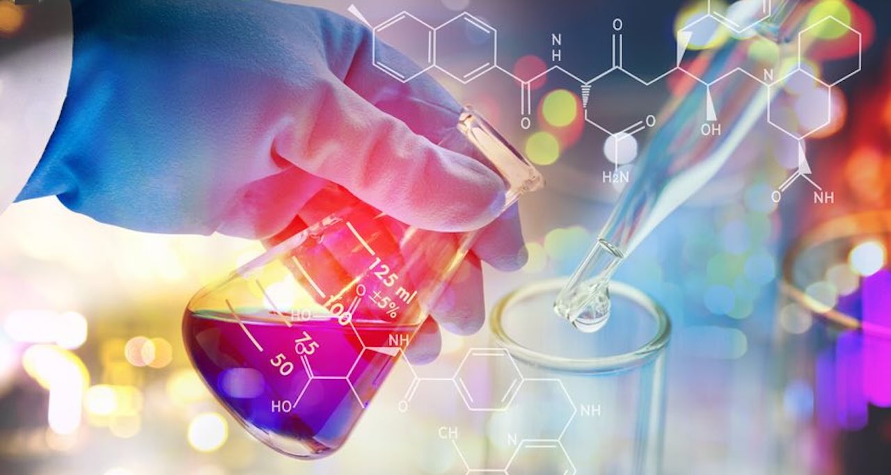 Scientist examining cancer cells in laboratory research setting at Northwestern University