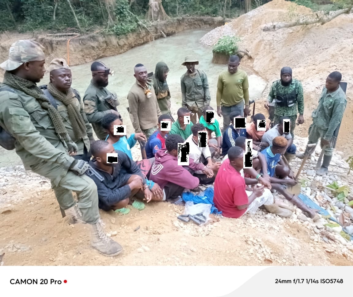 Forestry officers and community watchdogs dismantling illegal mining equipment in Ghana's Tano-Boin Forest Reserve