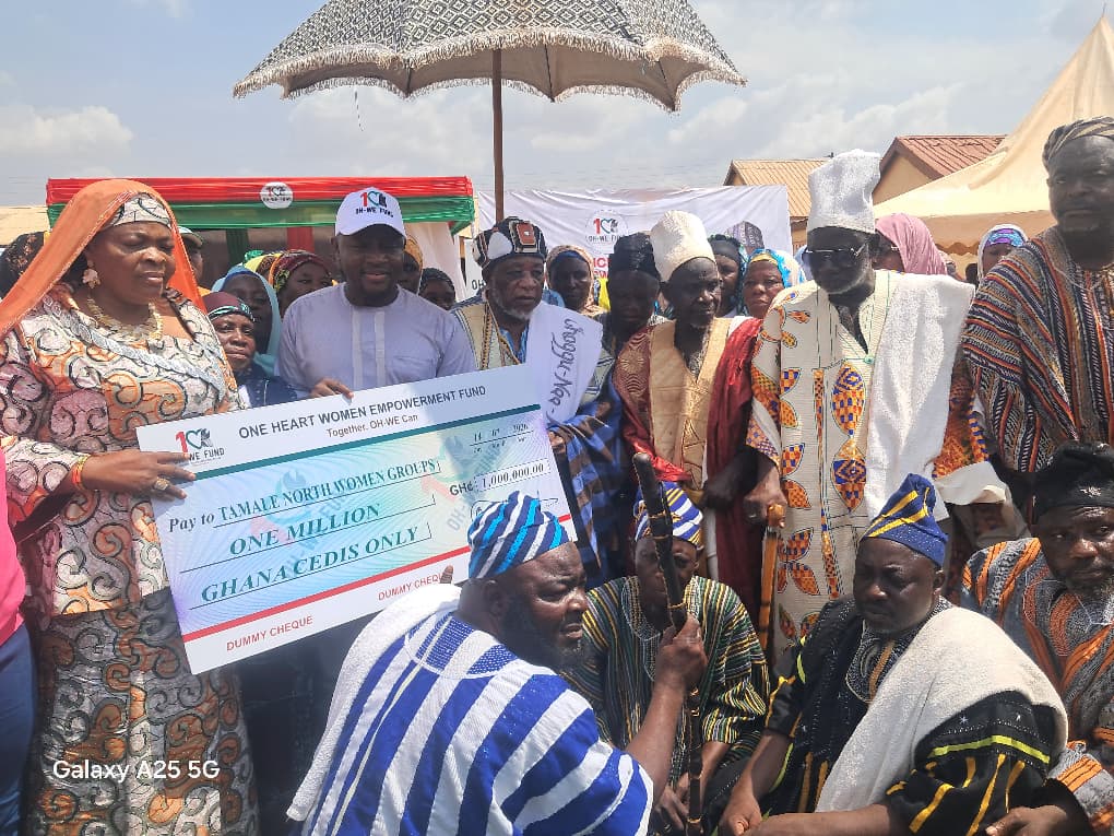Women entrepreneurs at outdoor market in Tamale, Ghana celebrating new business funding opportunity