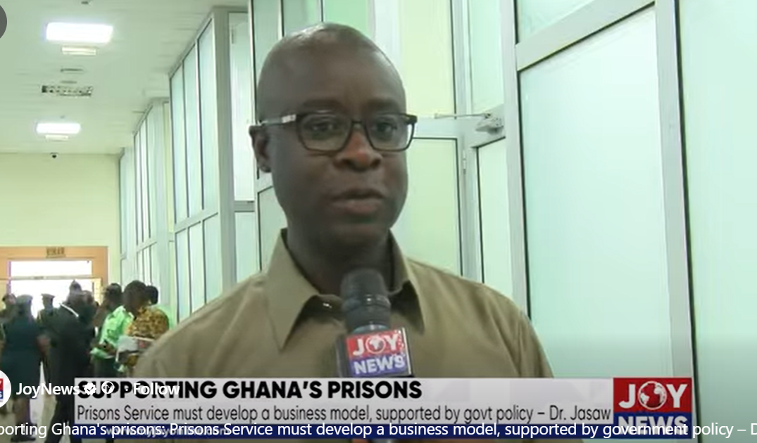 Prison workshop with inmates learning carpentry and furniture-making skills in Ghana
