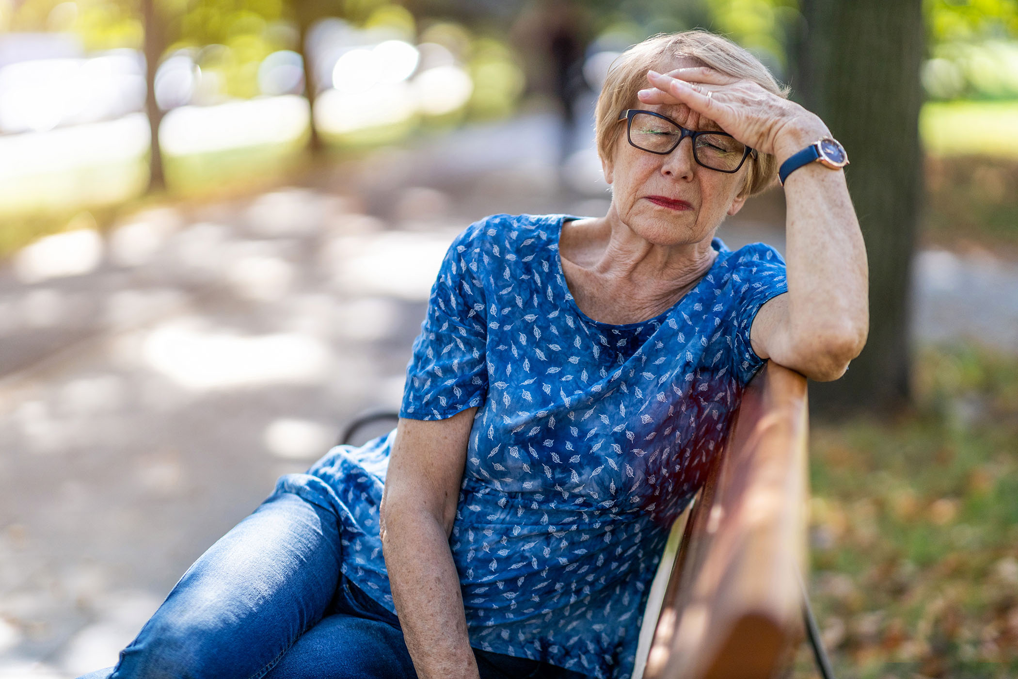 Medical researcher reviewing MRI scans showing muscle cell energy recovery in cancer survivors