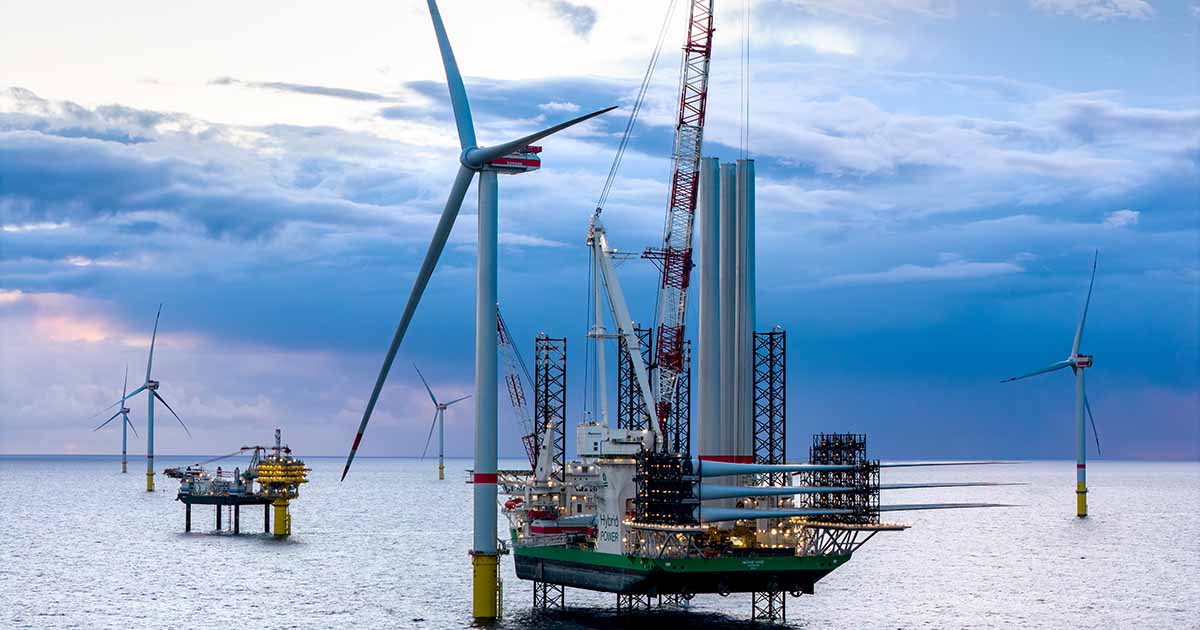 Offshore wind turbines rising from the North Sea generating clean electricity for Germany
