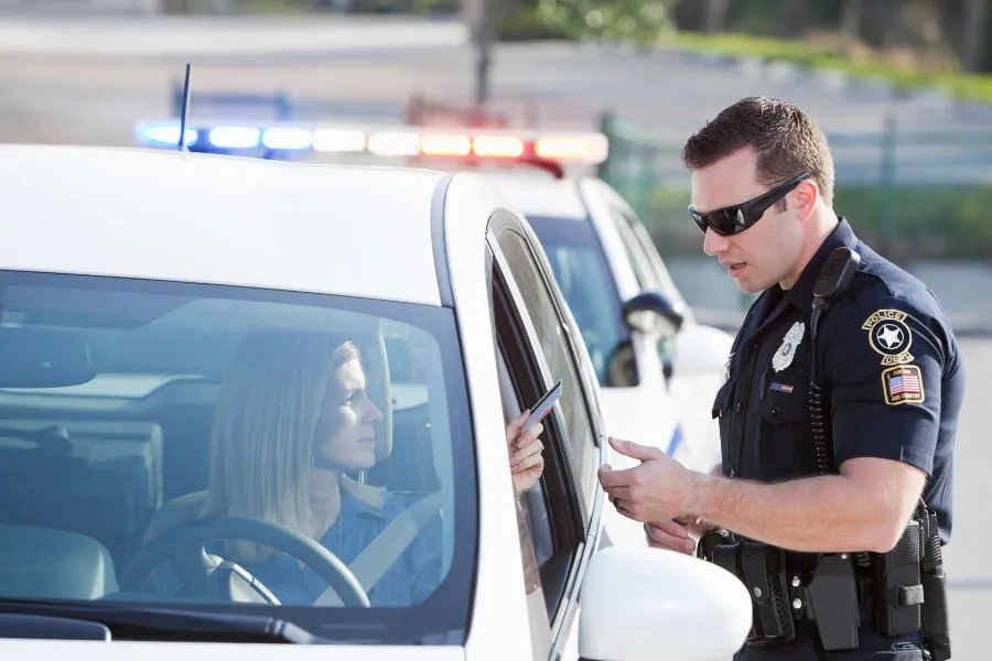 Officer Tickets Woman for Holding Phone in Missing Hand