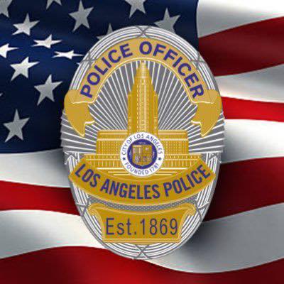 LAPD Devonshire police station exterior with American flag in Northridge, California
